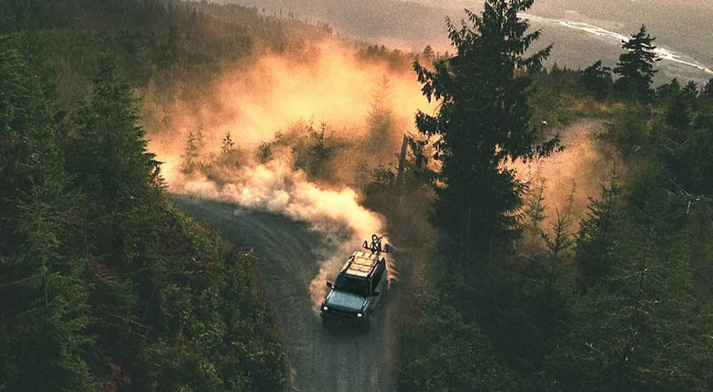 A blue 2026 Ford Bronco for sale off-roading.
