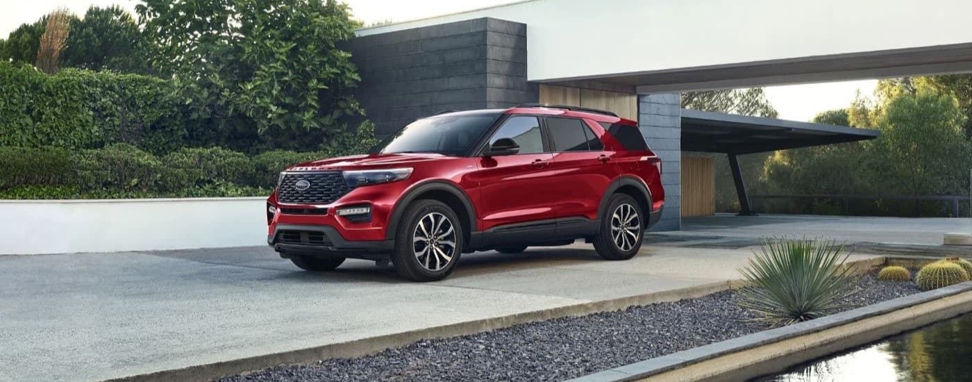 Red 2023 Ford Explorer ST parked in a driveway