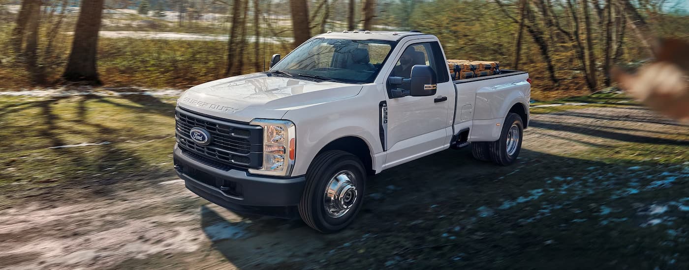 White 2026 Ford F-350 driving off-road.