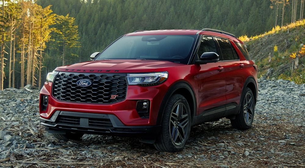A red 2027 Ford Explorer ST parked off-road.